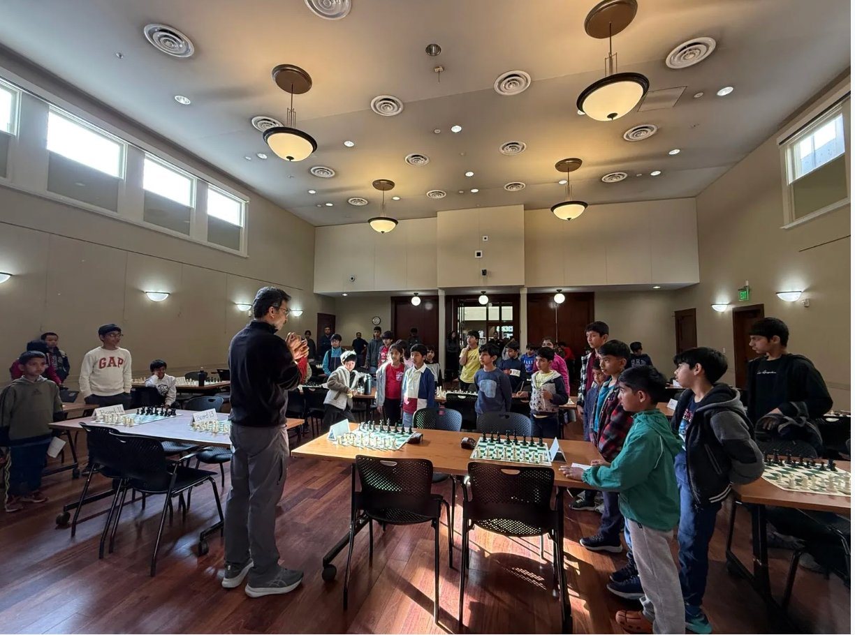 Chandan Maiti coaching students at SMC Chess Club